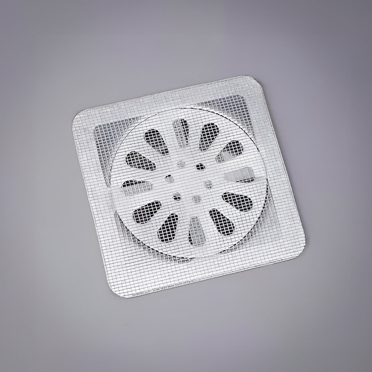 Telas adesivas descartáveis para ralos, kit de 10. Foto 2 do produto.