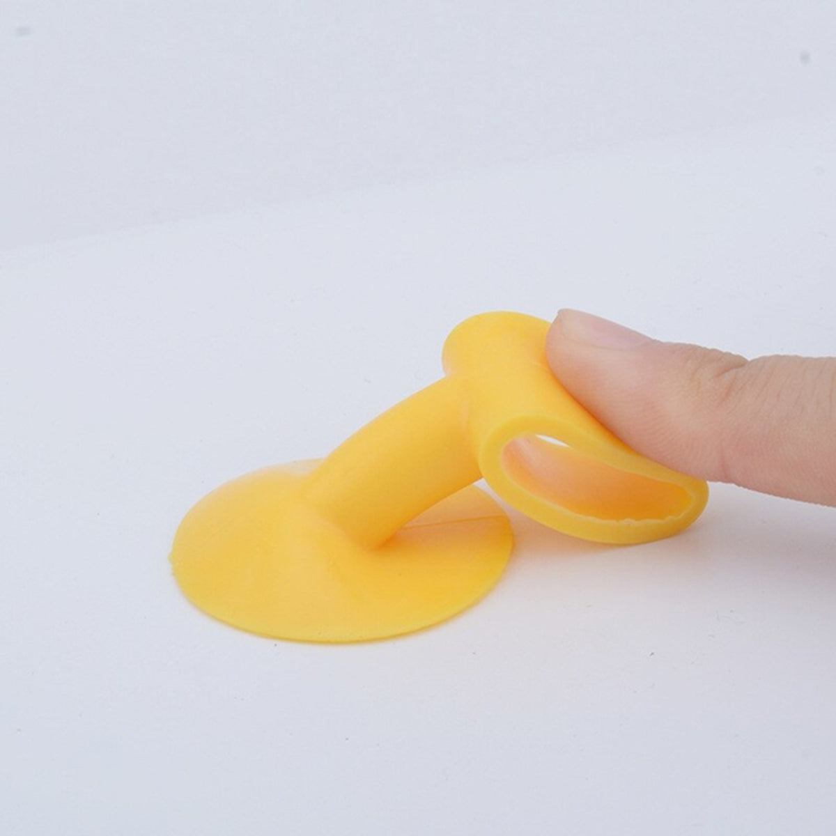 Protetor de silicone para maçaneta com ventosa, amarelo. Foto 3 do produto.