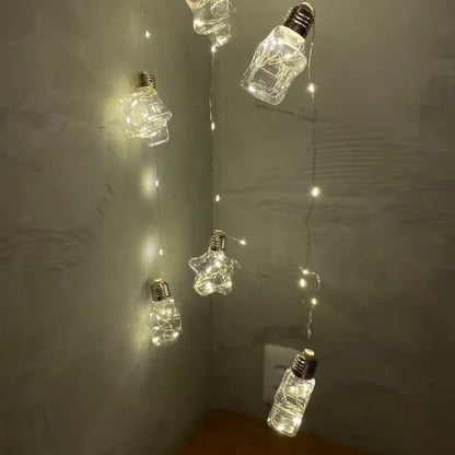 Fio de fada com 10 estrelas LED, USB e pilhas AA, Cor: Branco quente. Foto 1 do produto.