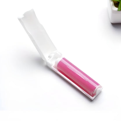 Rolo adesivo retrátil para remoção de pelos e poeira, Cor: Rosa. Foto 1 do produto.